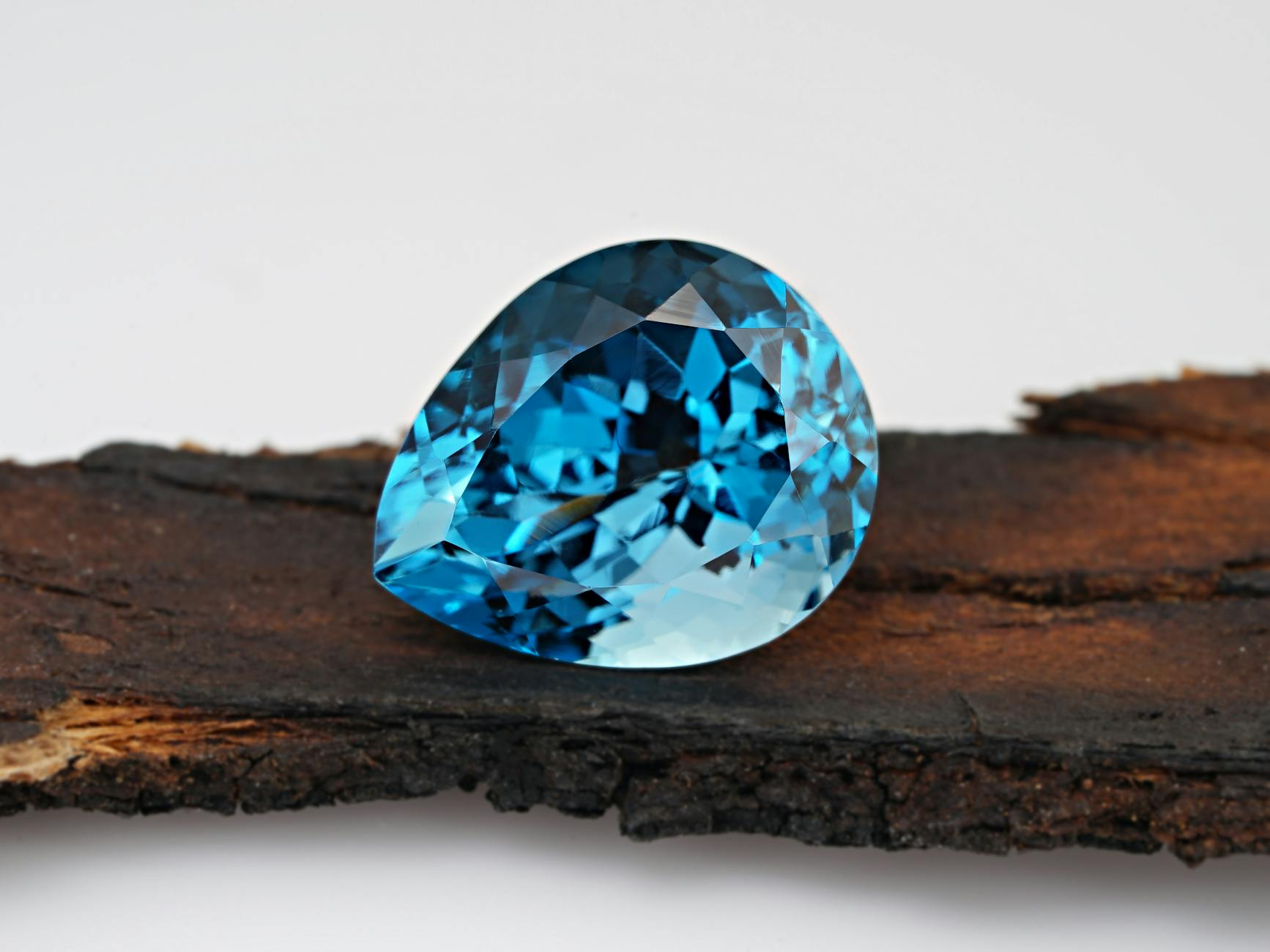 Swiss jewelry artisan faceting crystal