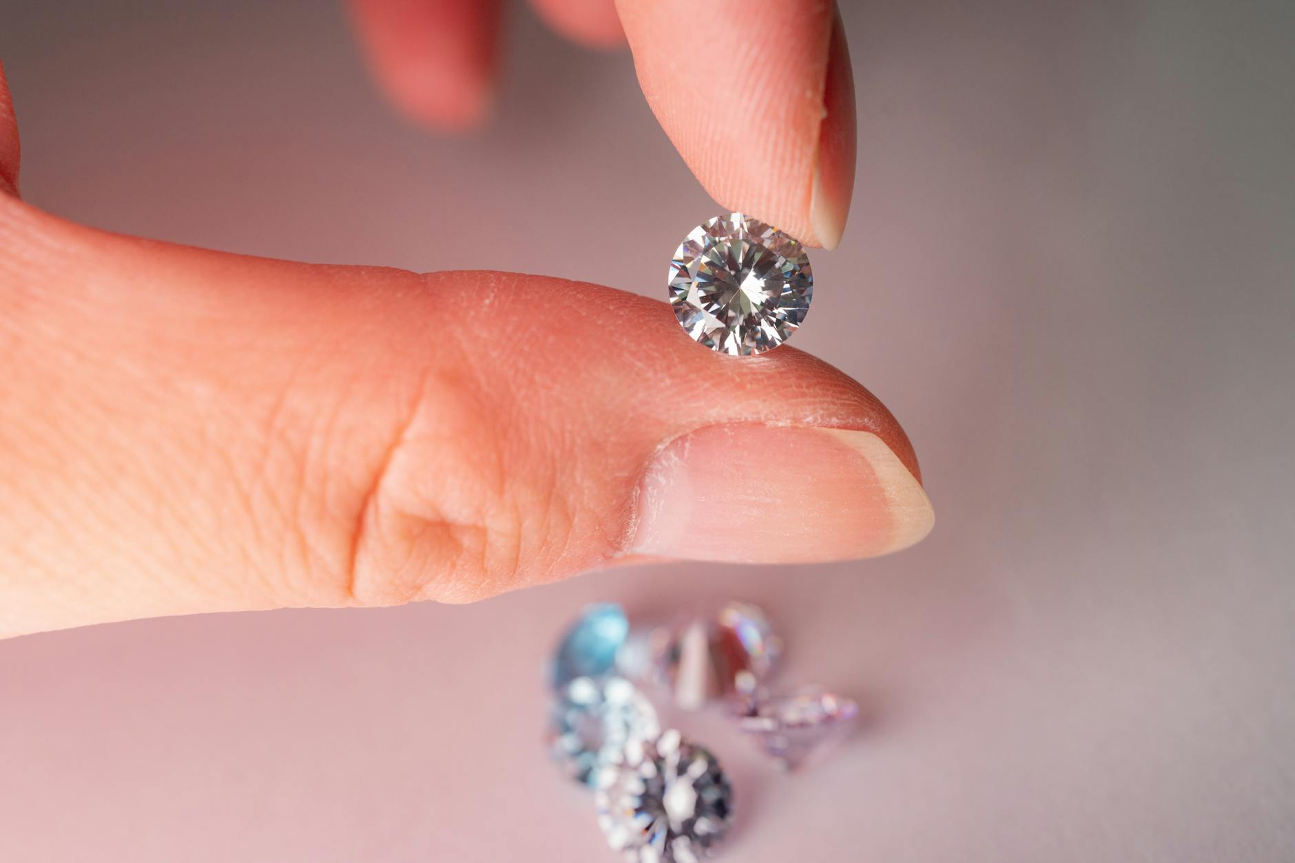 Swiss jewelry artisan faceting crystal